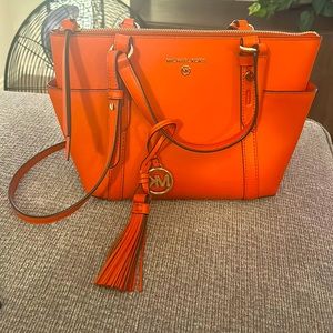 Orange Michael Kors purse